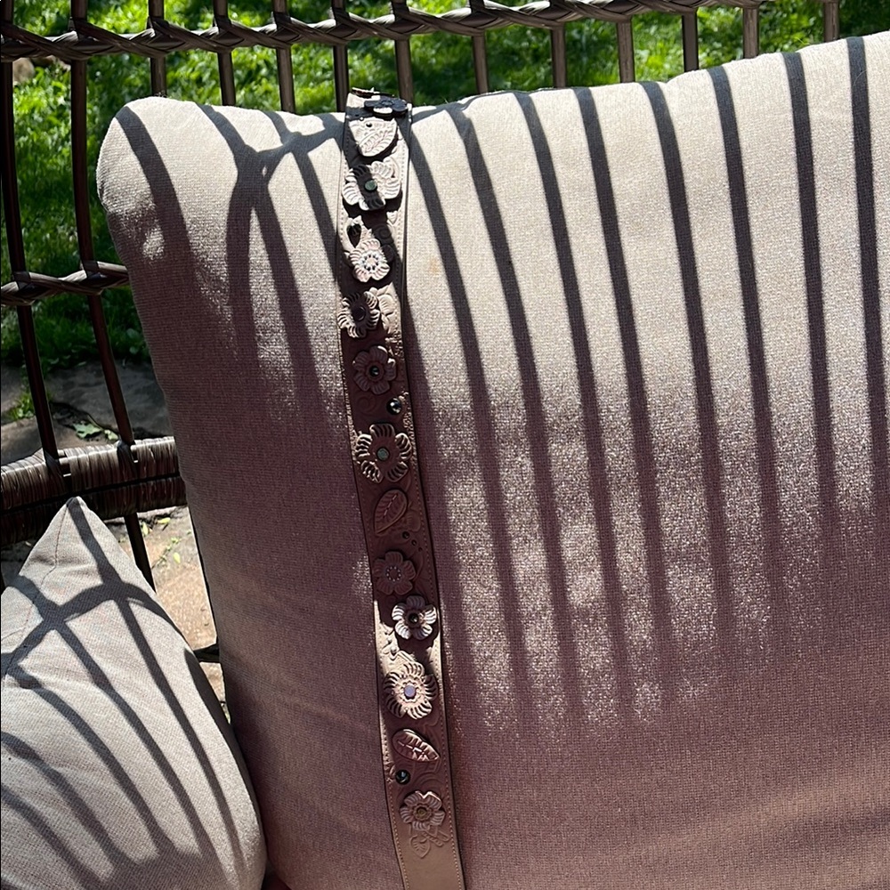 Coach beige or tan purse strap adorned with tiny with tiny Floral Accents